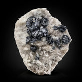 Metallic Hematite Crystals on Albite